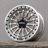 Delta R beadlock wheels displayed in raw finish, showcasing unique concave design and high-strength construction.