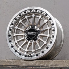 Delta R beadlock wheels displayed in raw finish, showcasing unique concave design and high-strength construction.
