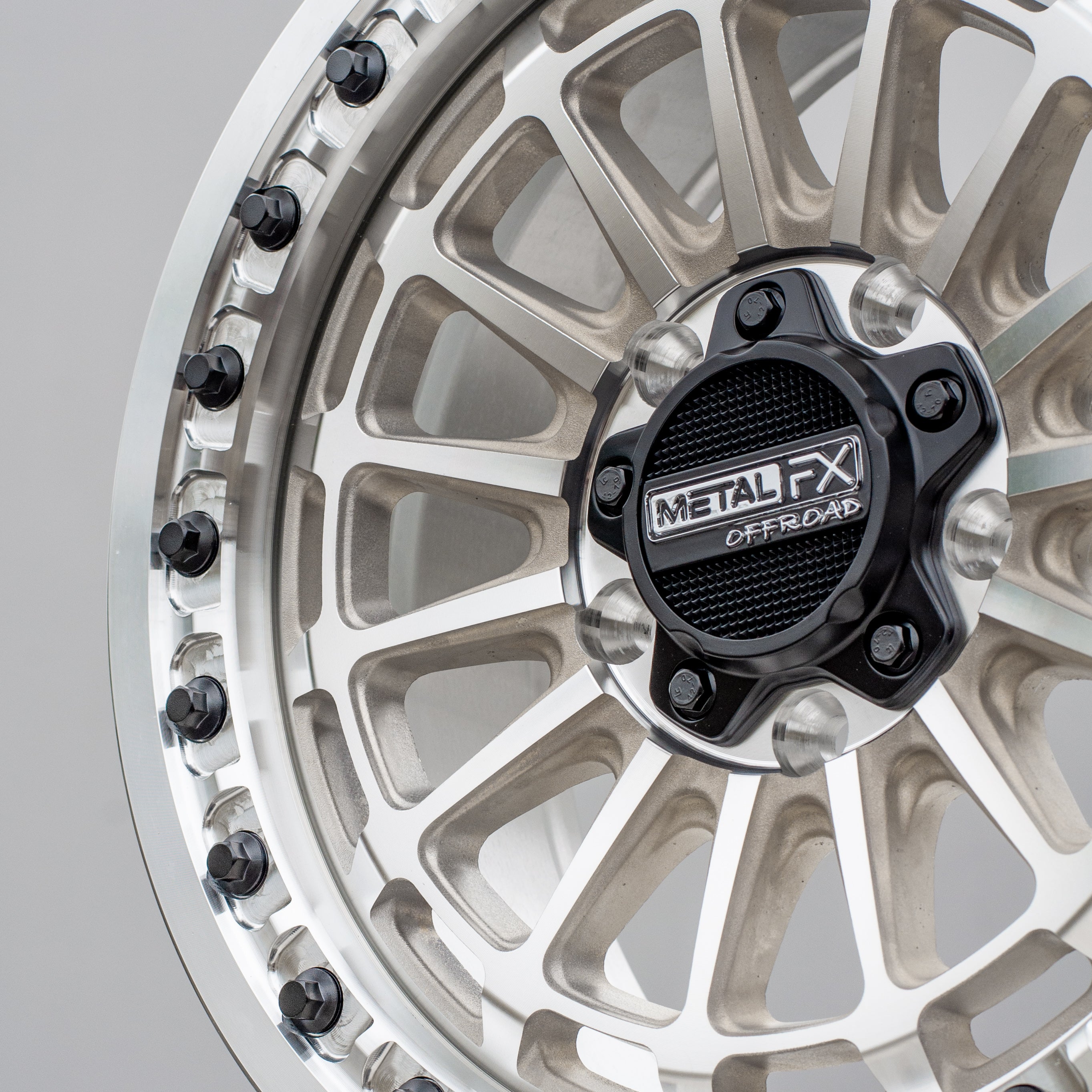 Delta R beadlock wheels showcasing a detailed metal finish and robust design by Metal FX Offroad.