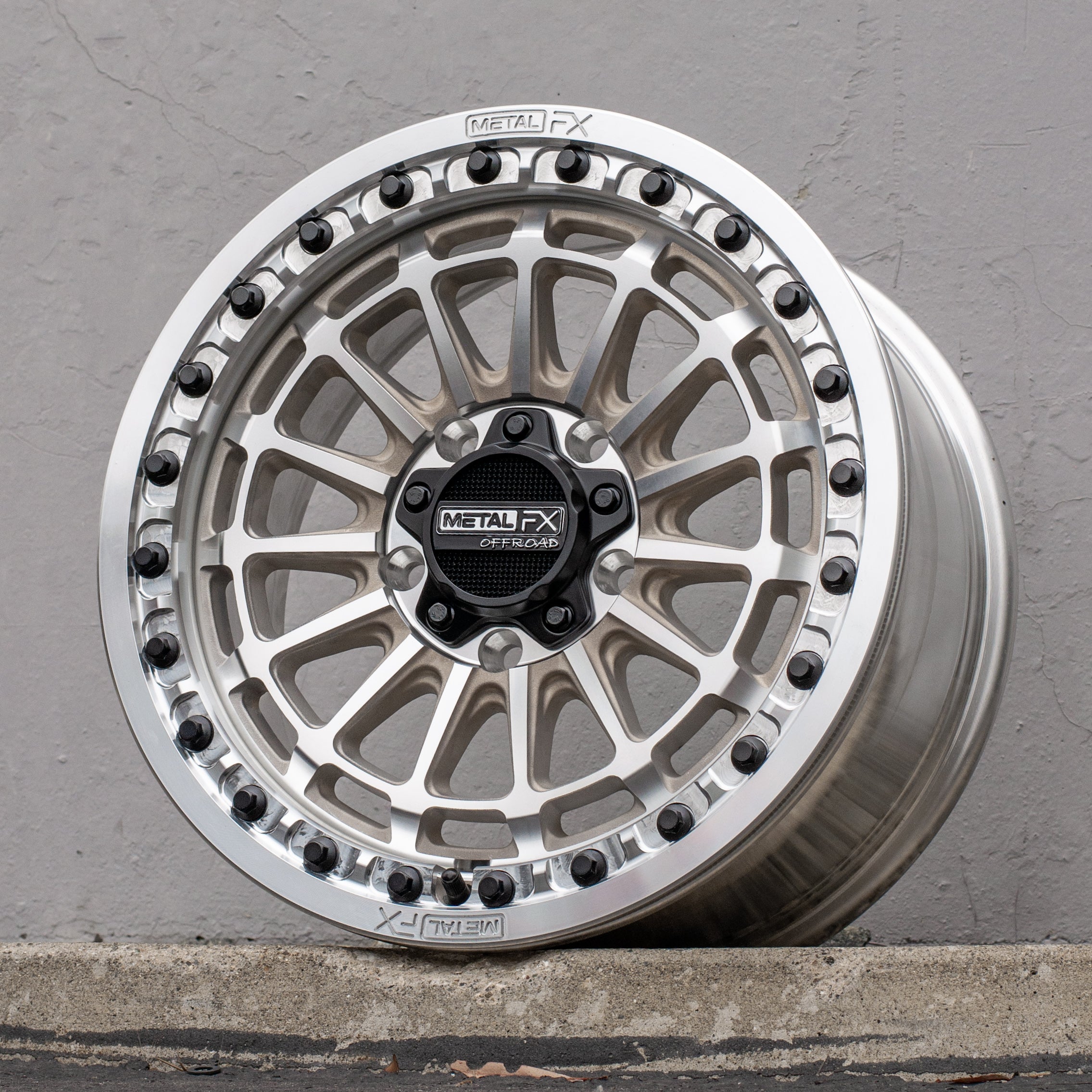 Delta R beadlock wheels displayed in raw finish, showcasing unique concave design and high-strength construction.