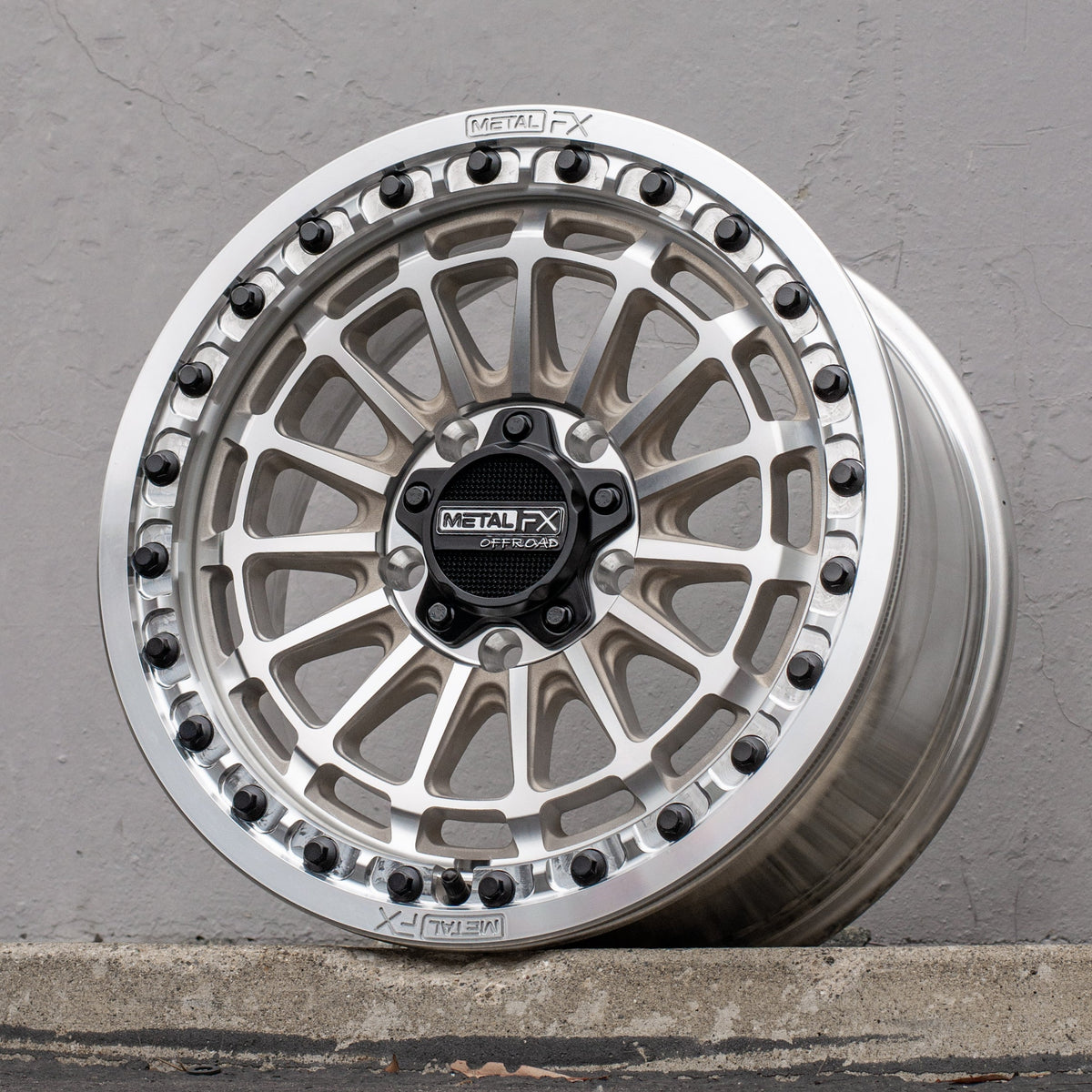 Delta R beadlock wheels displayed in raw finish, showcasing unique concave design and high-strength construction.