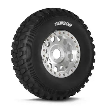 Tensor DS Desert Series UTV tire with thick tread blocks and ribbed sidewall for enhanced performance and durability.